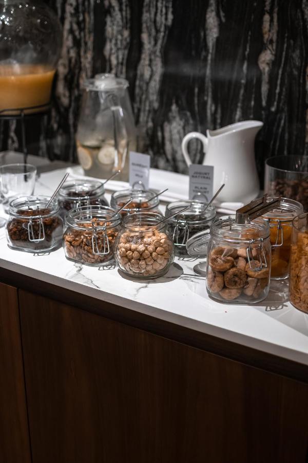 Hotel Manami Pristina Esterno foto Dried fruit at a buffet